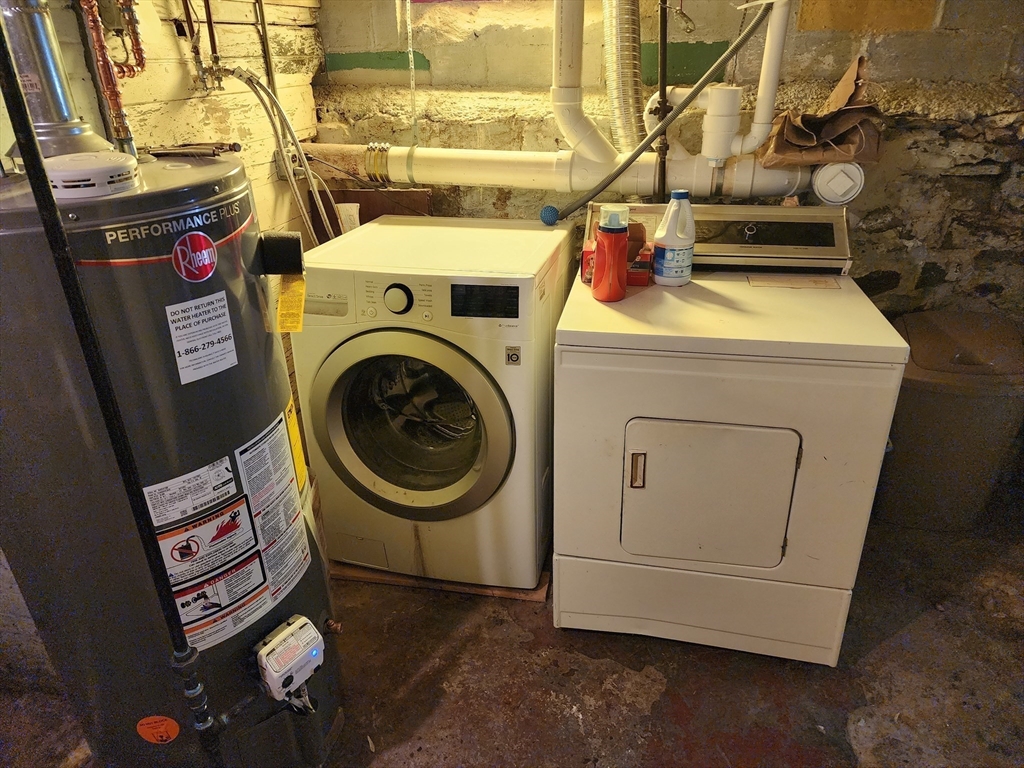 17 Davis Street Taunton, MA 02780 - Photo 26 of 26 a utility room with dryer and washer