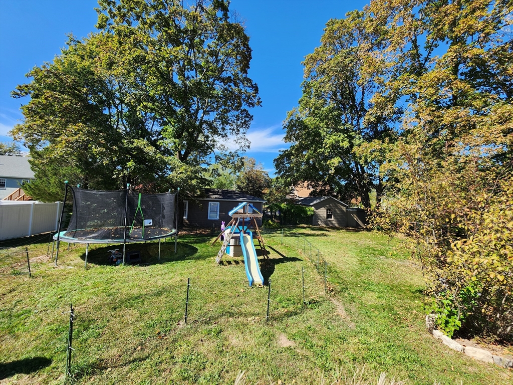 17 Davis Street Taunton, MA 02780 - Photo 8 of 26 a view of a backyard with slide