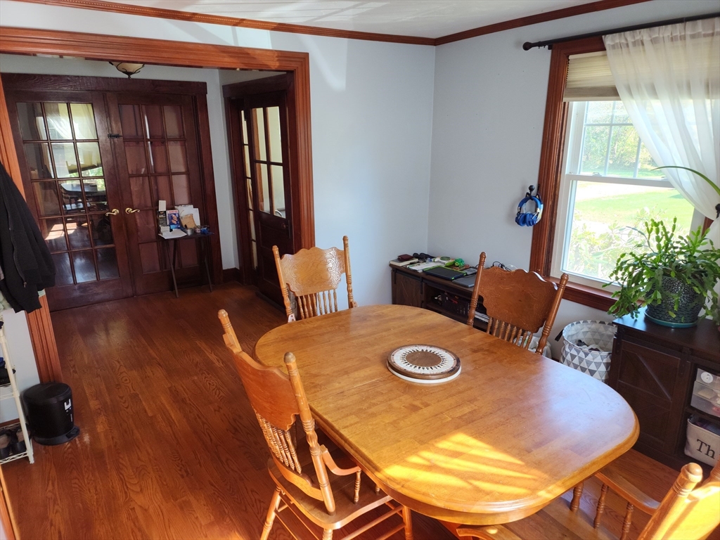 17 Davis Street Taunton, MA 02780 - Photo 10 of 26 a view of a dining room with furniture window and wooden floor