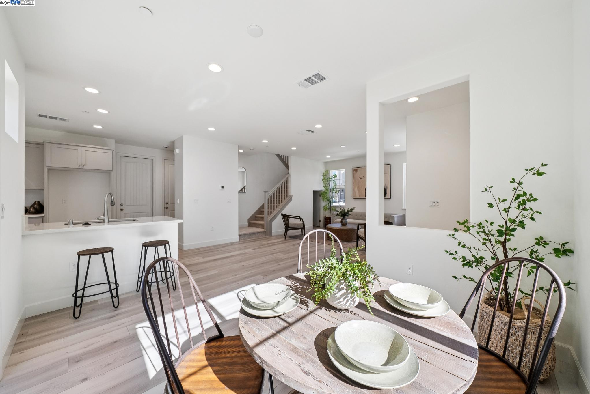 246 Mindy Way Pittsburg, CA 94565 - Photo 14 of 38 a dining room with furniture and wooden floor