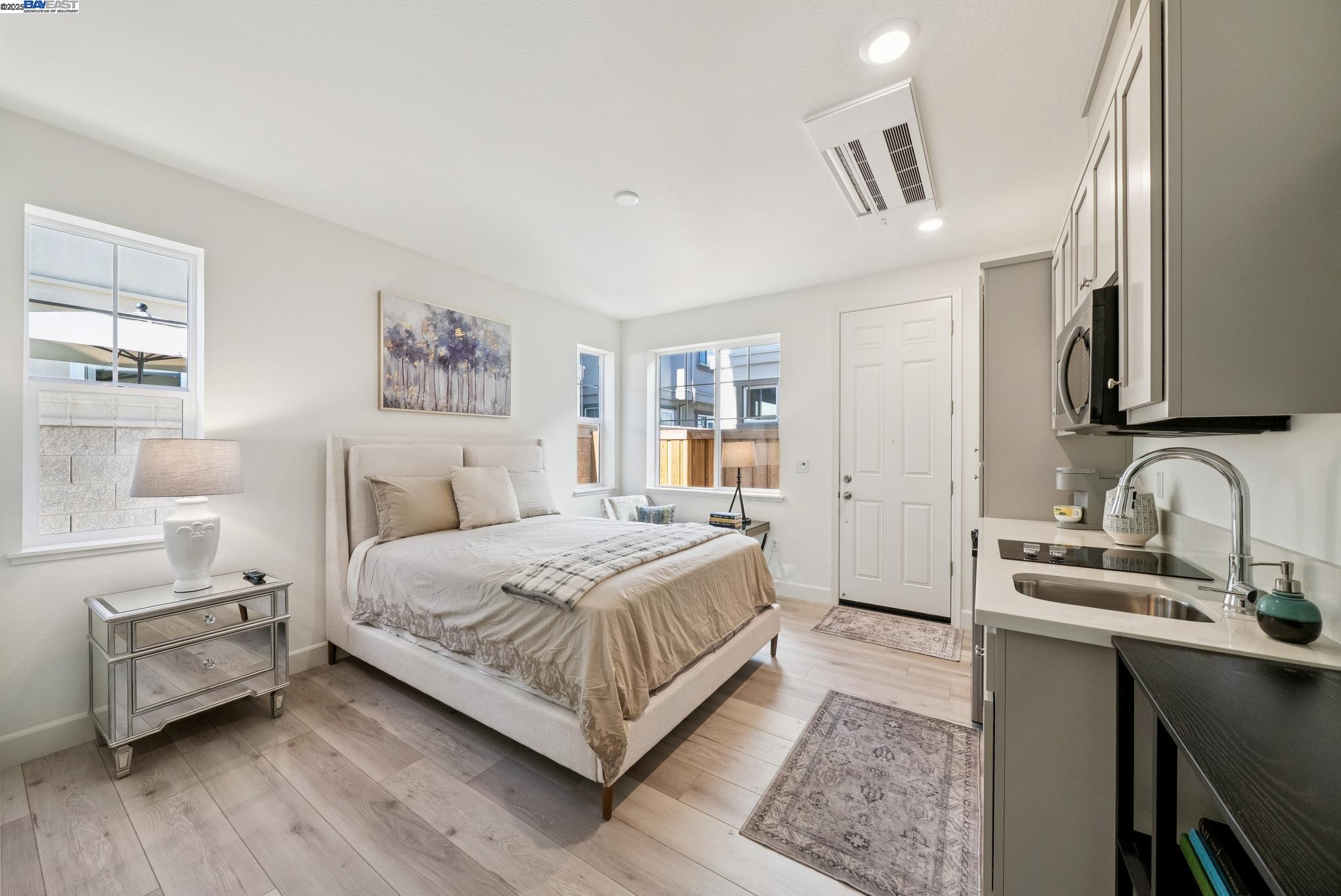 246 Mindy Way Pittsburg, CA 94565 - Photo 16 of 38 a bedroom with a bed and a furniture