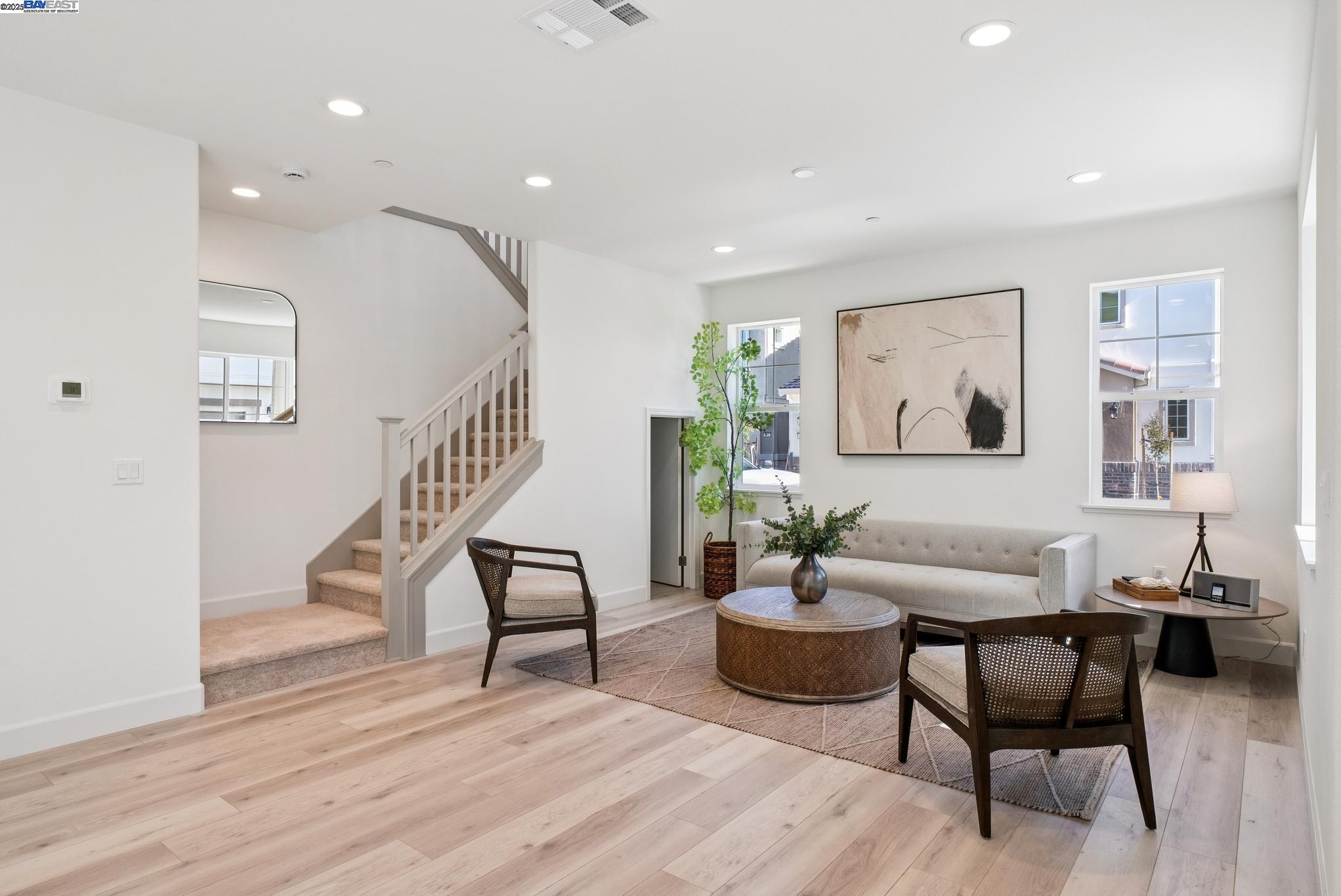 246 Mindy Way Pittsburg, CA 94565 - Photo 7 of 38 a living room with furniture and a wooden floor