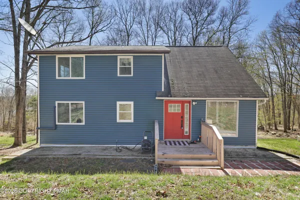 a front view of house with yard