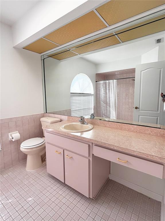 1503 Overland Drive Spring Hill, FL 34608 - Photo 13 of 20 a bathroom with a sink and a toilet