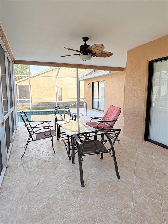 1503 Overland Drive Spring Hill, FL 34608 - Photo 18 of 20 a view of a dining room with furniture window and outside view