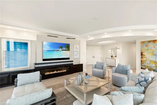 a kitchen with stainless steel appliances kitchen island granite countertop a sink and cabinets