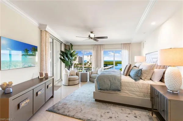 a bathroom with a granite countertop sink a mirror a shower and a bathtub