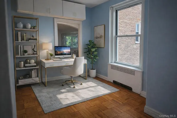 a workspace with furniture window and wooden floor