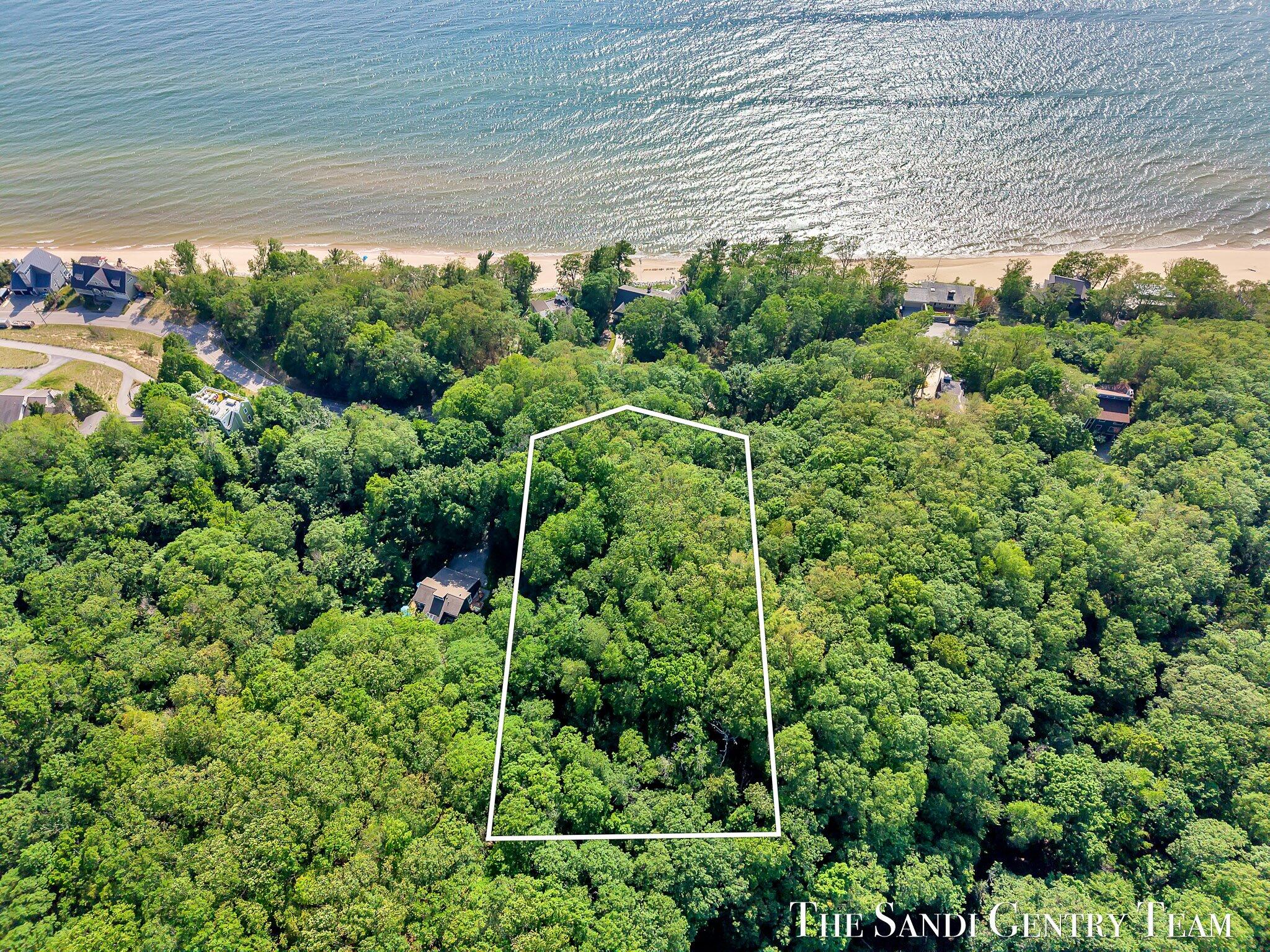 18200 North Shore Estates Road Spring Lake, MI 49456 - Photo 2 of 13 02-DJI_20250617173202_0353_D_KYLE-Edit