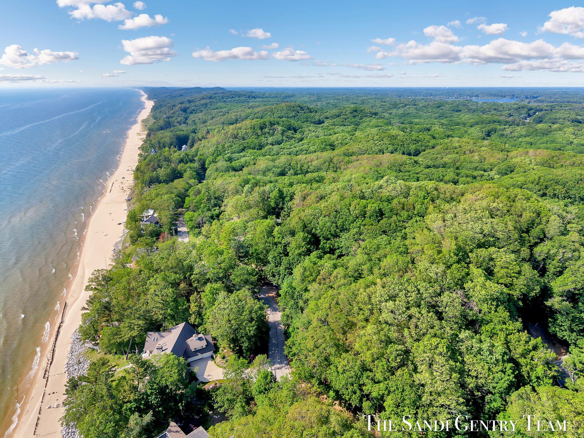 18200 North Shore Estates Road Spring Lake, MI 49456 - Photo 3 of 13 03-DJI_20250617173439_0390_D_KYLE