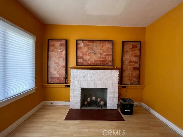 a living room with a fireplace