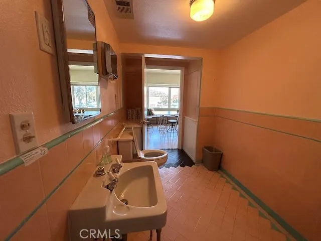 a room with storage and windows