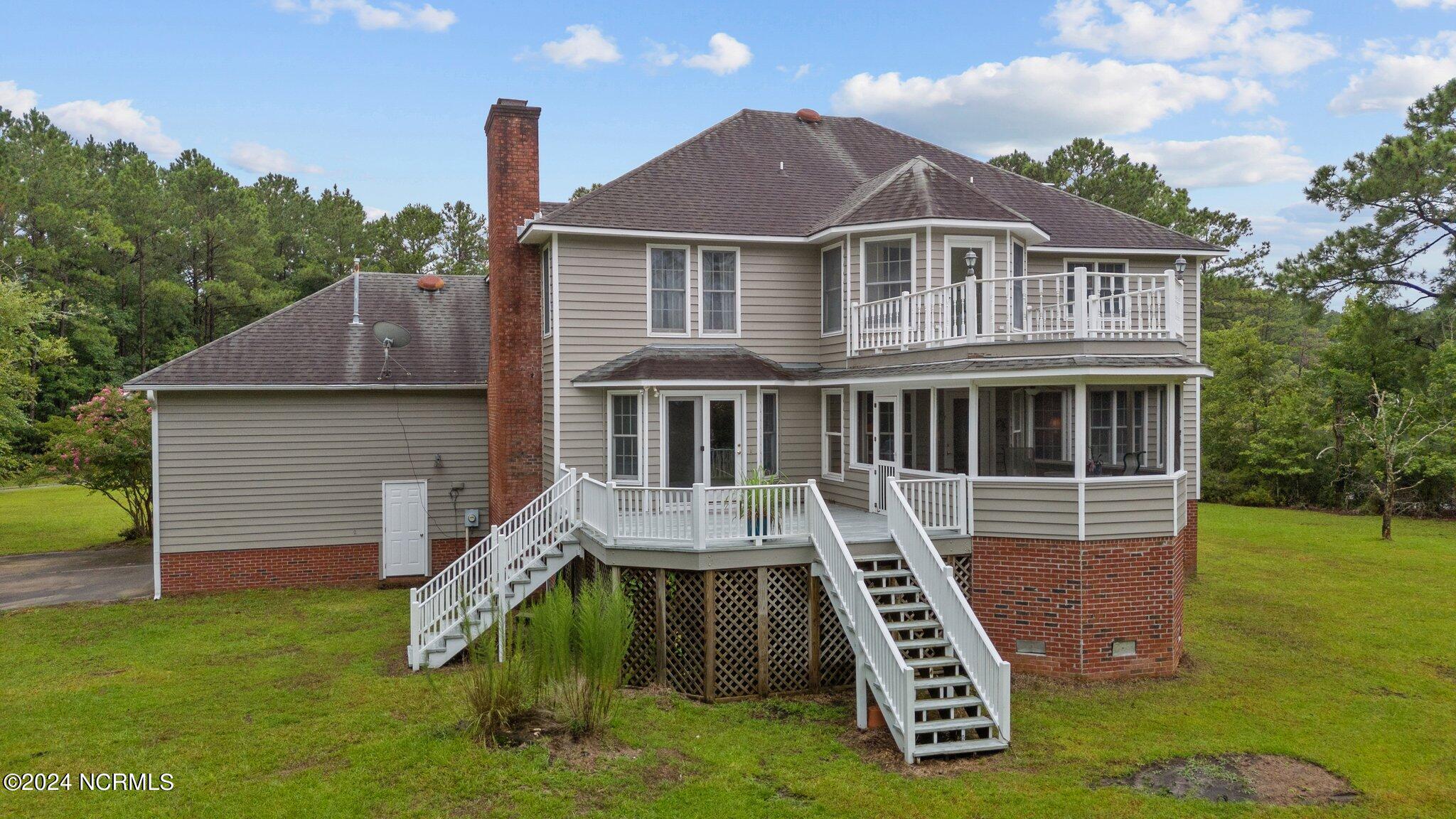 1039 Pasture Point Road Merritt, NC 28556 - Photo 23 of 77 12-web-or-mls-DJI_20240726105645_0079_D