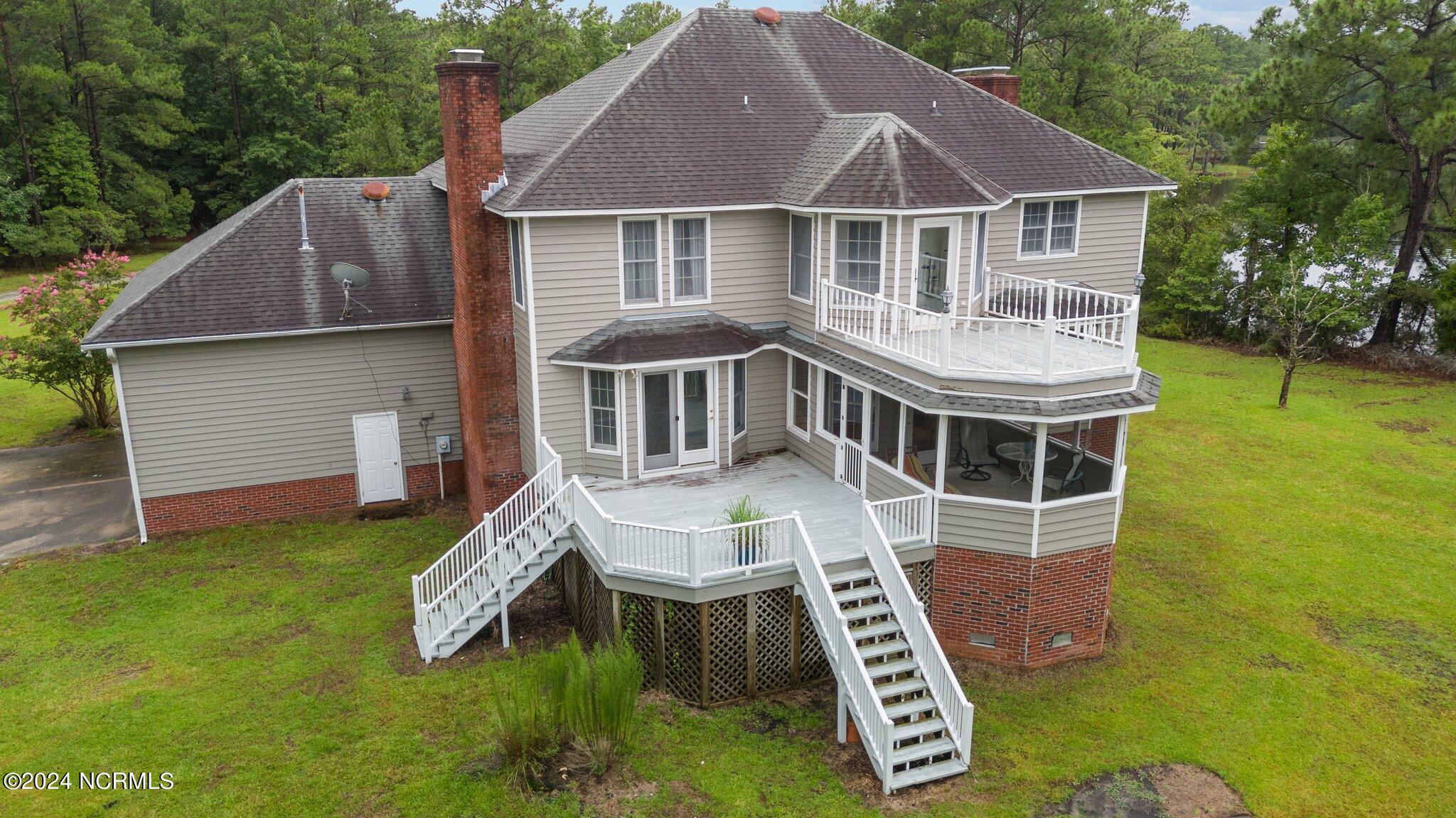 1039 Pasture Point Road Merritt, NC 28556 - Photo 24 of 77 13-web-or-mls-DJI_20240726105707_0080_D