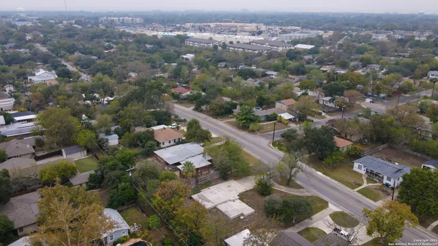 an aerial view of a city with lots of residential buildings