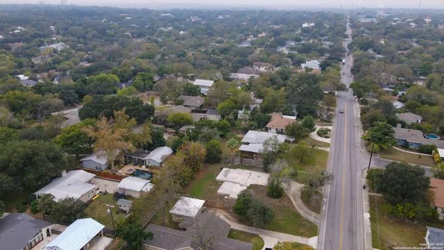 an aerial view of a city with lots of residential buildings