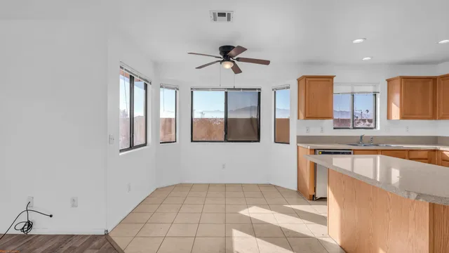 a view of a kitchen with a sink