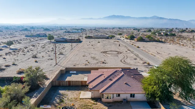 an aerial view of beach and ocean