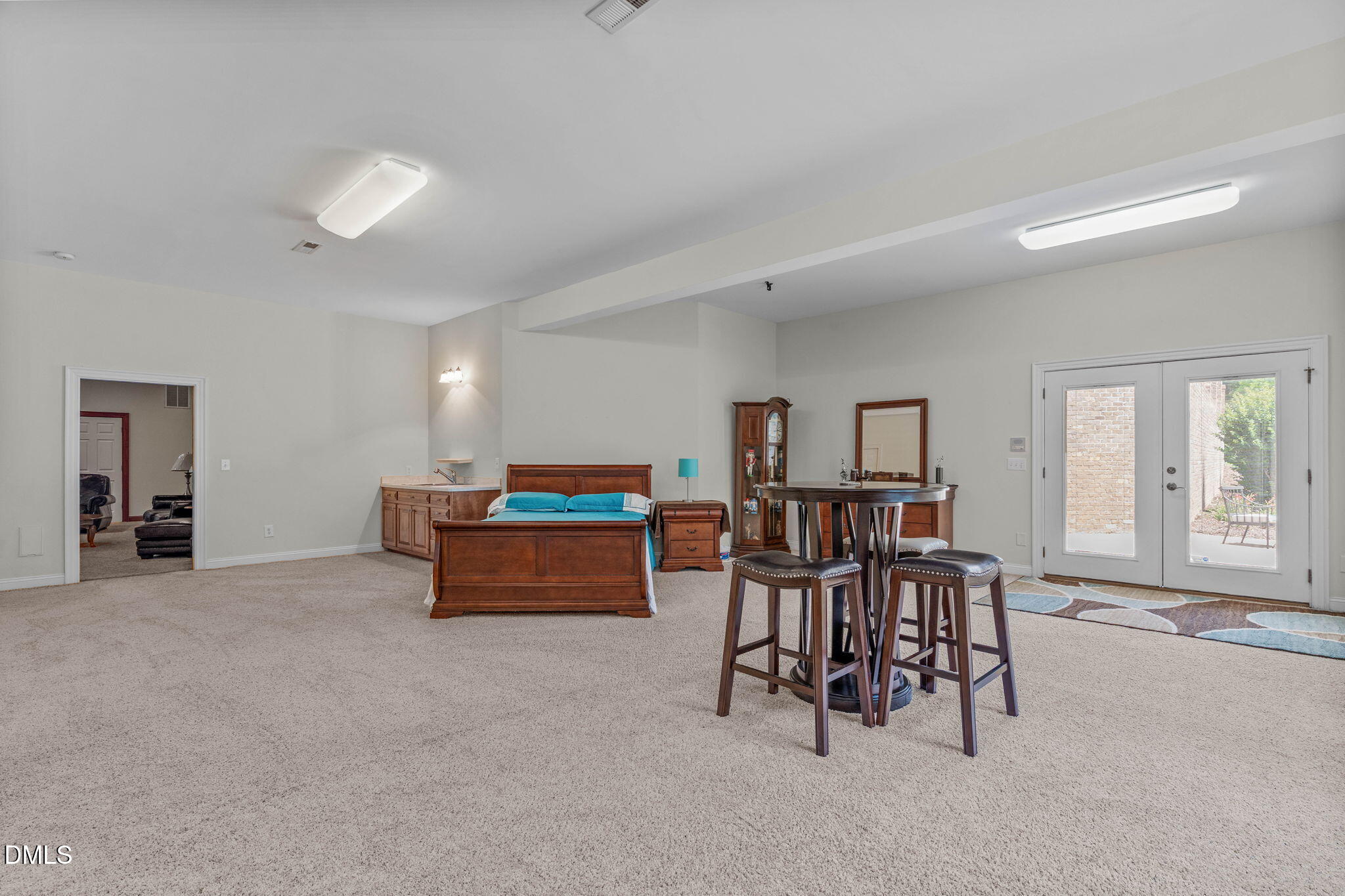10917 Jordan Road Raleigh, NC 27603 - Photo 37 of 58 a dining room with furniture and a chandelier
