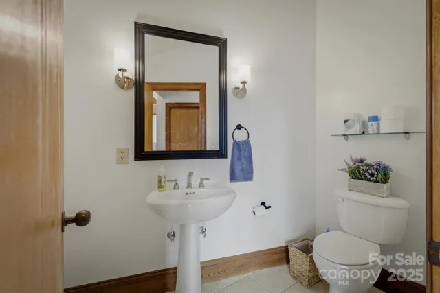 a kitchen with a sink cabinets and appliances