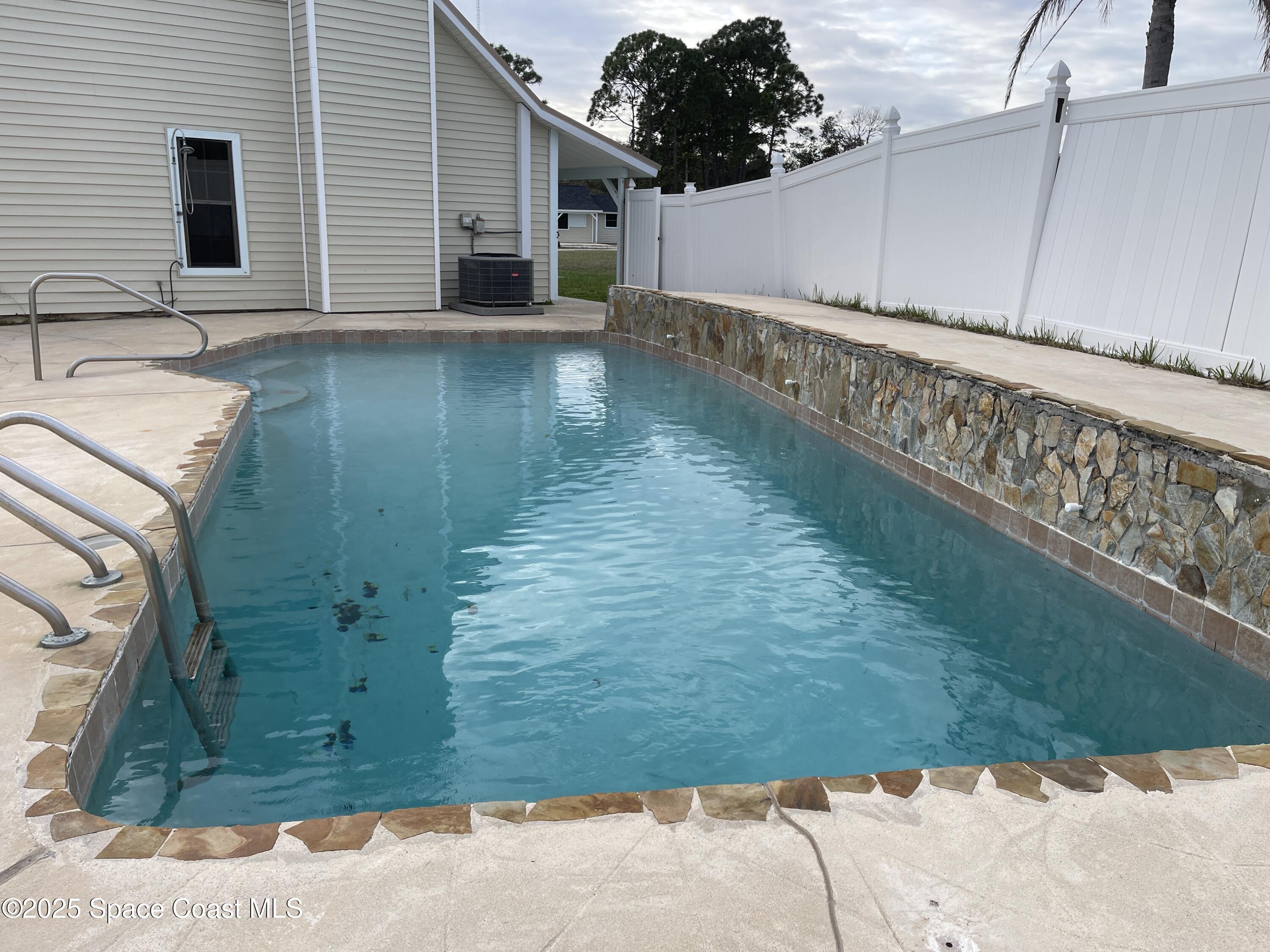 3445 Fox Lake Road Titusville, FL 32780 - Photo 6 of 43 a view of a backyard