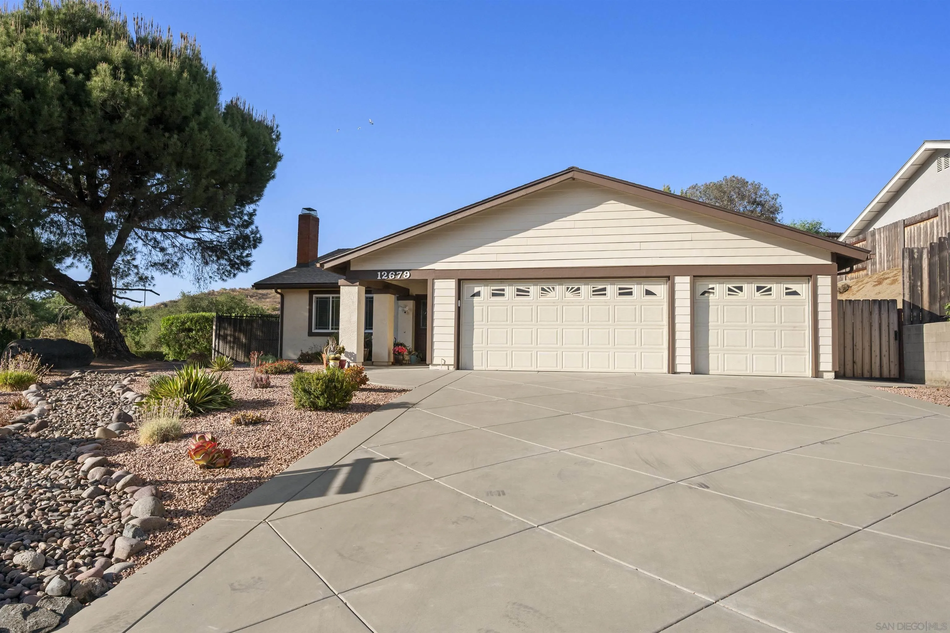 12679 Ridgeton Drive Lakeside, CA 92040 - Photo 3 of 33 a front view of a house with garden