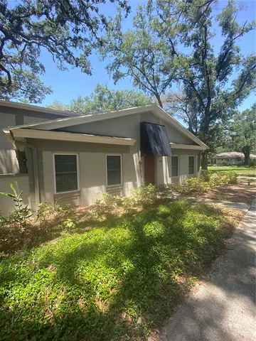 front view of house with a yard