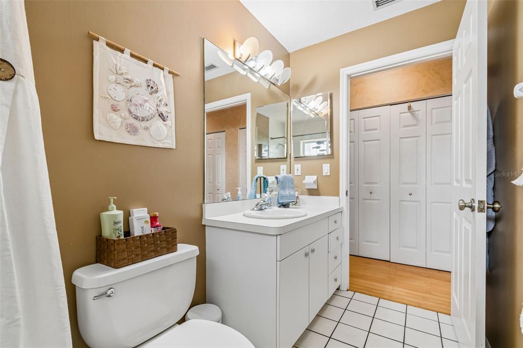 119 Burns Road Terra Ceia, FL 34250 - Photo 56 of 100 a bathroom with a sink and a mirror