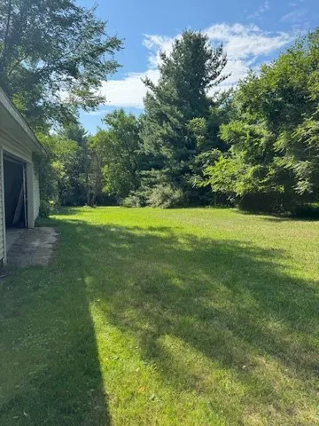 a view of a golf course with a yard