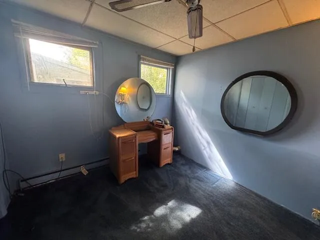 a view of a livingroom with furniture