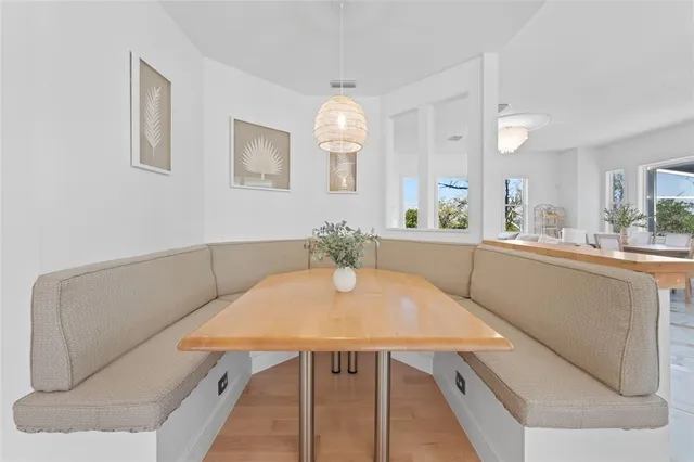 a bathroom with a double vanity sink mirror and toilet