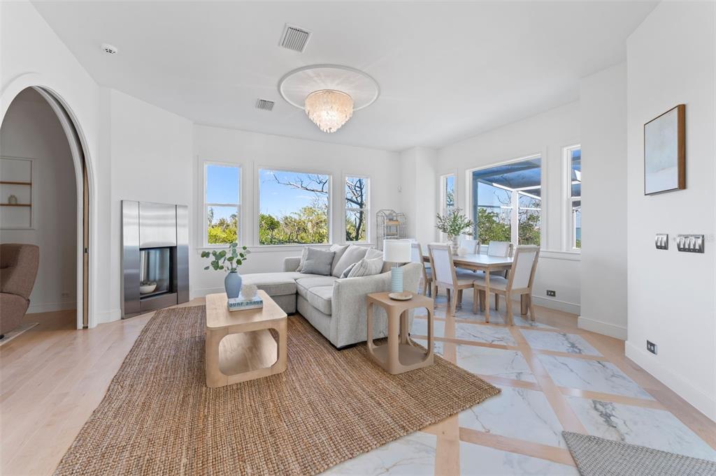 4150 Snail Island Court Boca Grande, FL 33921 - Photo 20 of 98 a living room with furniture and a wooden floor