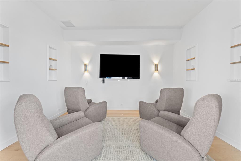 4150 Snail Island Court Boca Grande, FL 33921 - Photo 23 of 98 a living room with furniture and a flat screen tv