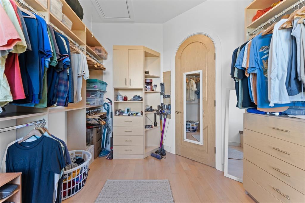 4150 Snail Island Court Boca Grande, FL 33921 - Photo 50 of 98 a view of walk in closet with clothes and shoes