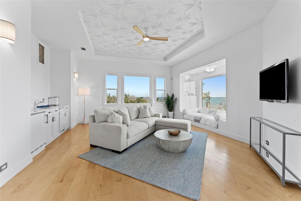 4150 Snail Island Court Boca Grande, FL 33921 - Photo 53 of 98 a living room with furniture and a flat screen tv