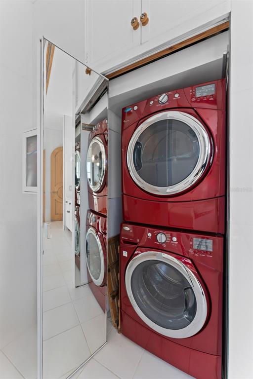 4150 Snail Island Court Boca Grande, FL 33921 - Photo 60 of 98 a utility room with dryer and lots of washer