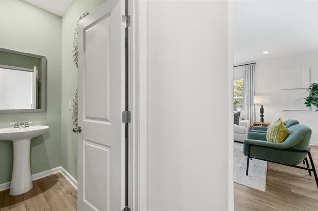 a spacious bedroom with a bed and a couch