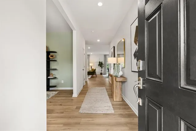 a view of a living room with a wooden floor