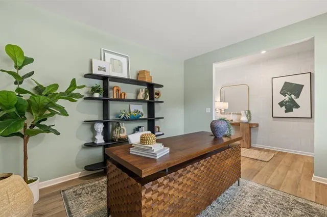 a view of a workspace with furniture