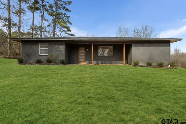 a view of a yard with an outdoor space