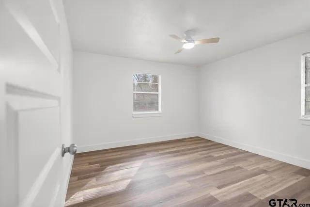 a view of a room that has a window in it