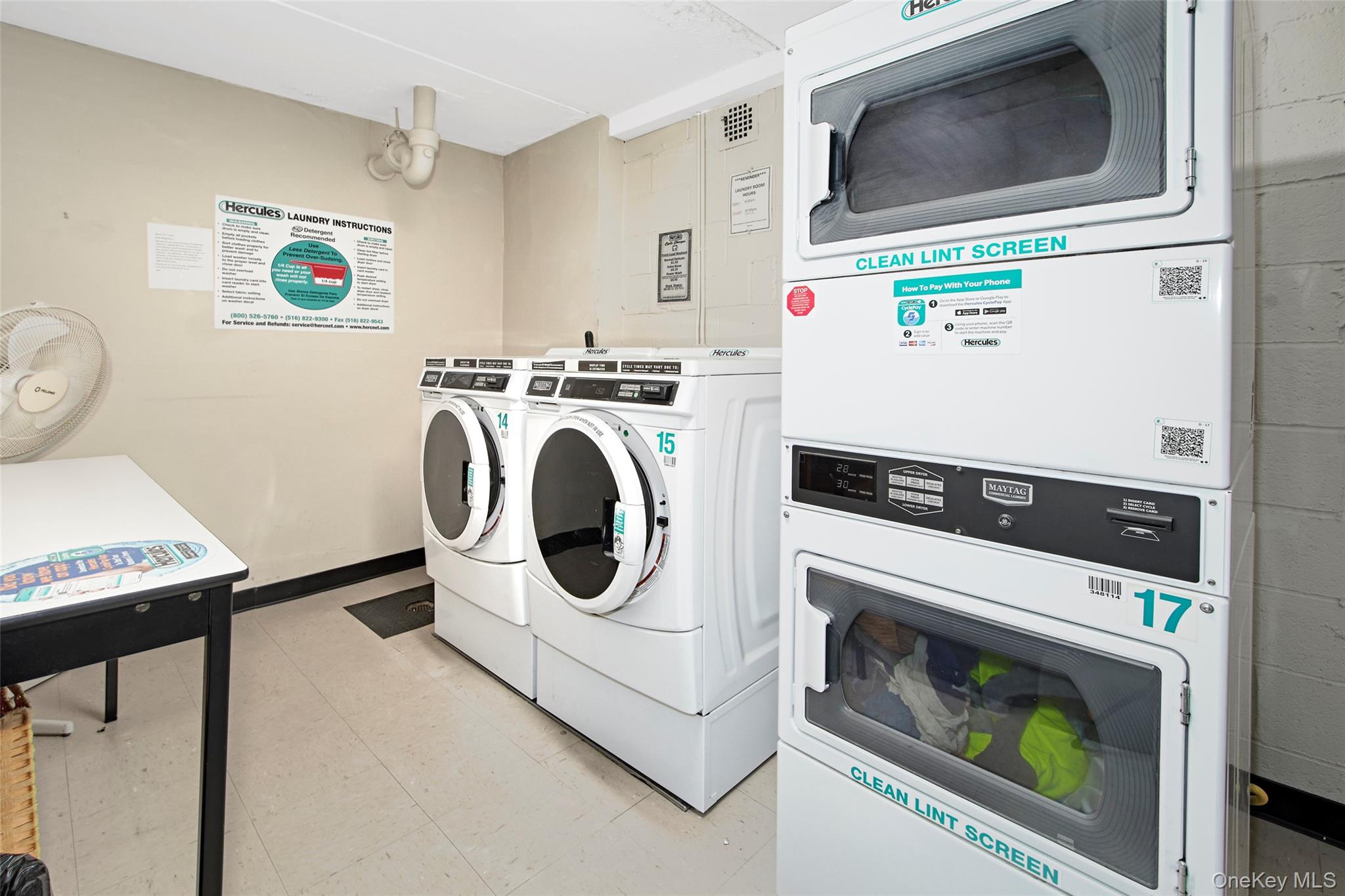 470 Halstead Avenue, Unit 2T Harrison, NY 10528 - Photo 21 of 23 a utility room with dryer and washer