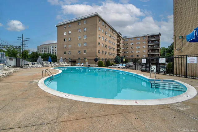 a view of outdoor space swimming pool and seating