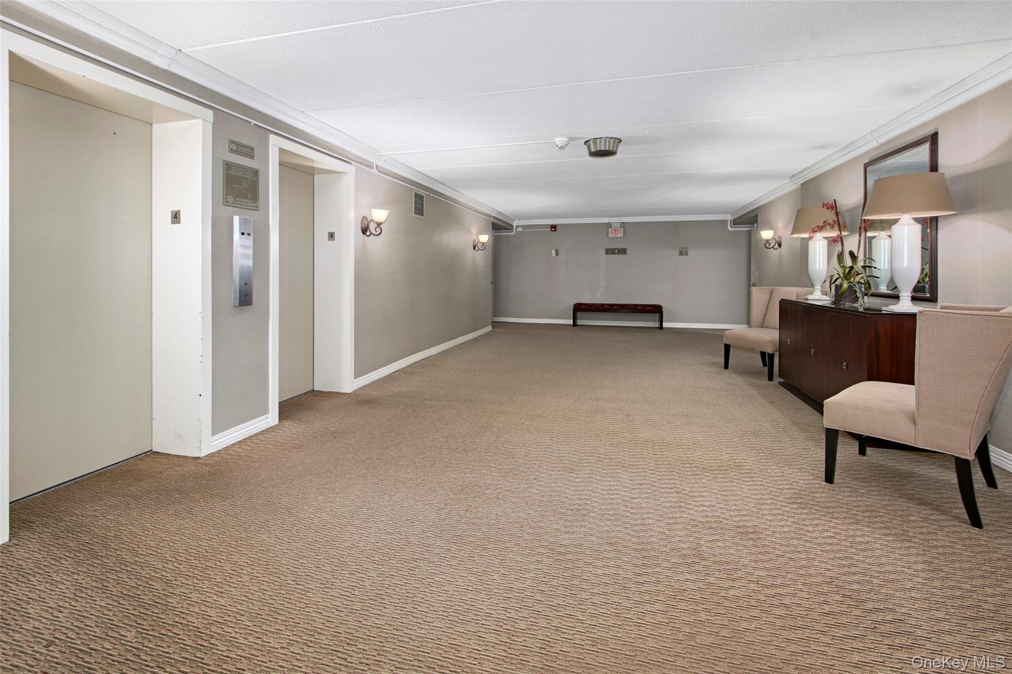 470 Halstead Avenue, Unit 2T Harrison, NY 10528 - Photo 4 of 23 a view of a livingroom with furniture and a couch