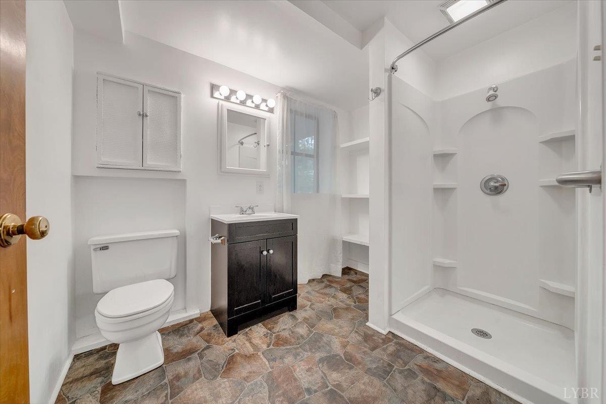 2044 Indian Hill Road Lynchburg, VA 24503 - Photo 26 of 30 a bathroom with a toilet and a shower