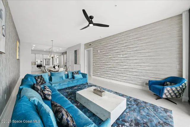 a living room with furniture and a rug