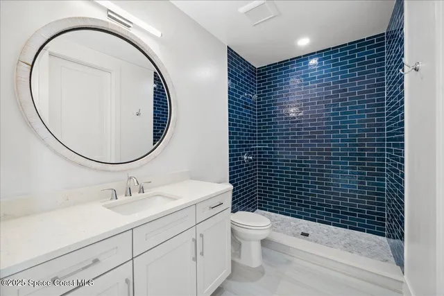 a view of a hallway with washer and dryer