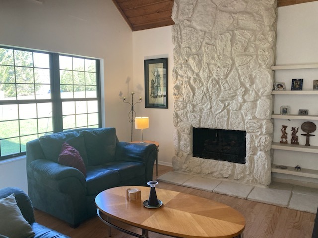 593 Dunham Road Gurnee, IL 60031 - Photo 5 of 29 a living room with furniture and a fireplace