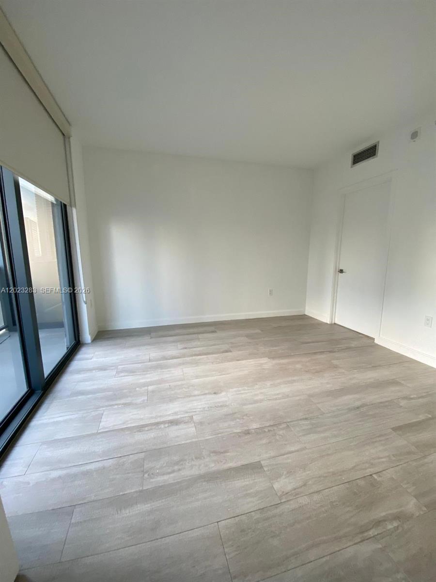 55 Southwest 9th Street, Unit 1503 Miami, FL 33130 - Photo 8 of 11 a view of an empty room