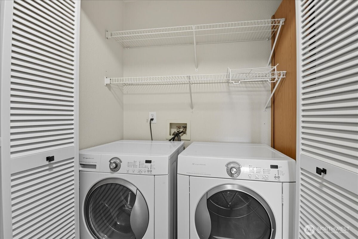18150 73rd Avenue Northeast, Unit B306 Kenmore, WA 98028 - Photo 20 of 32 a view of washer and dryer in a utility room